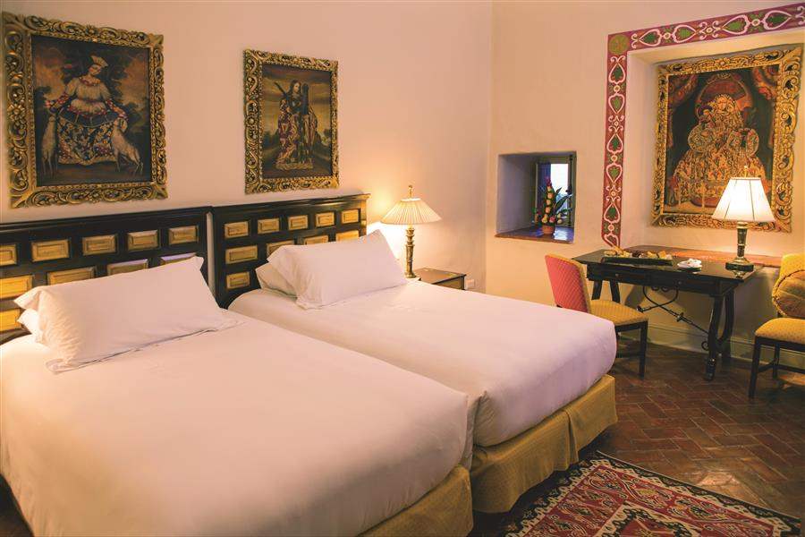 Hotel Monasterio Cusco deluxe room