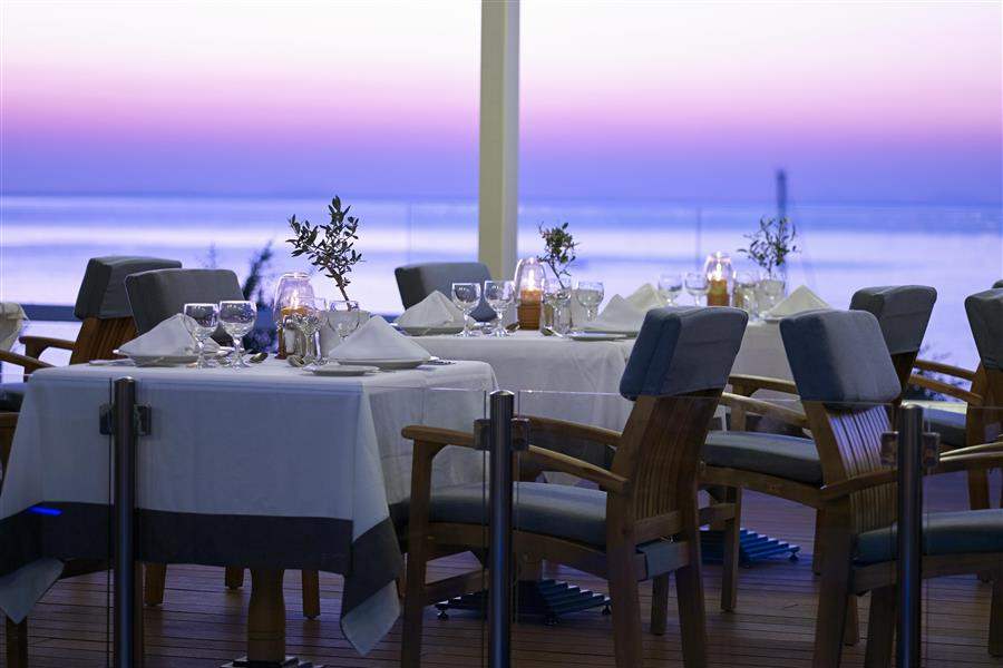 Restaurant with sea view at sunset